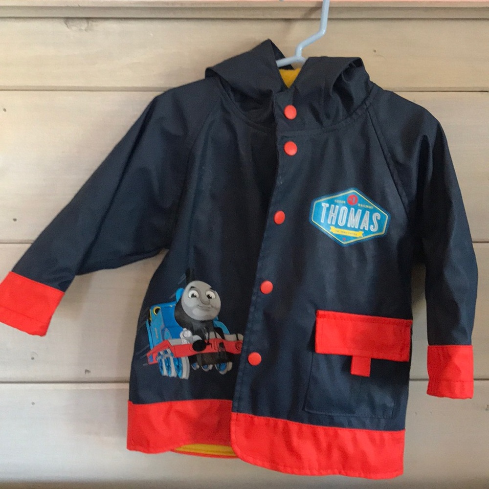 Gently used rain coat , Thomas the train